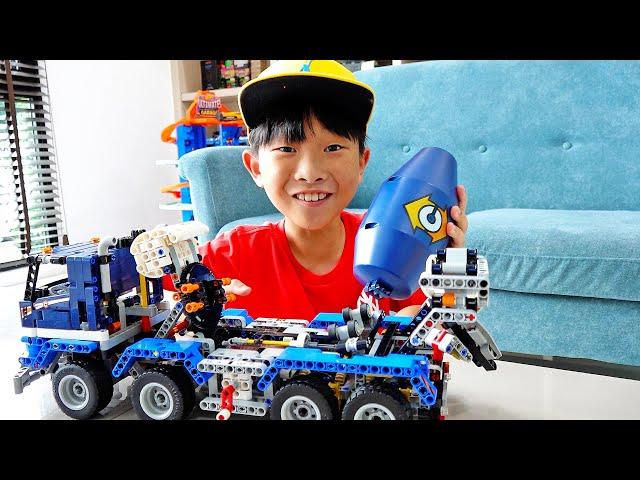 Yejun's mixer truck toy assembly play with Lego Technic car toy.