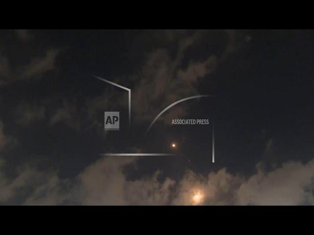 Air defence systems in action over Tel Aviv as projectiles fired at Israel