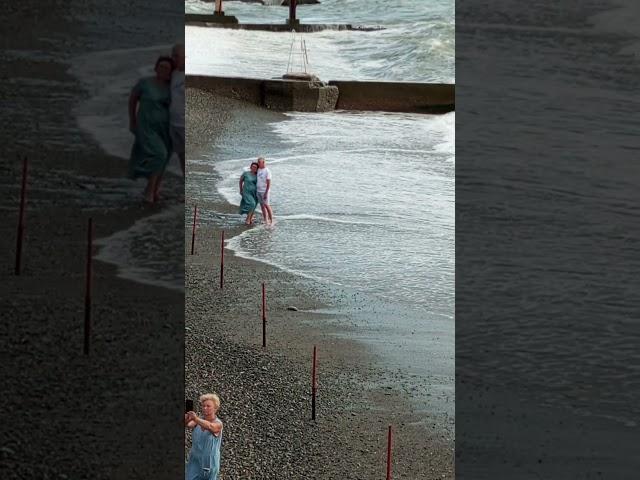 13 Sochi, a couple is photographed against the background of a curtain