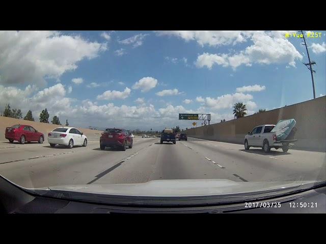 Mattress Flying Off the Back of a Pickup Truck