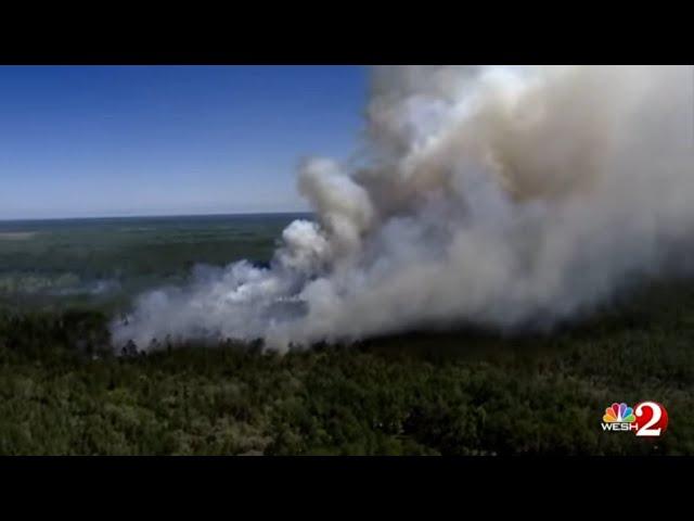 Chopper 2 over a brush fire in Central Florida where Lake, Seminole, Volusia counties meet