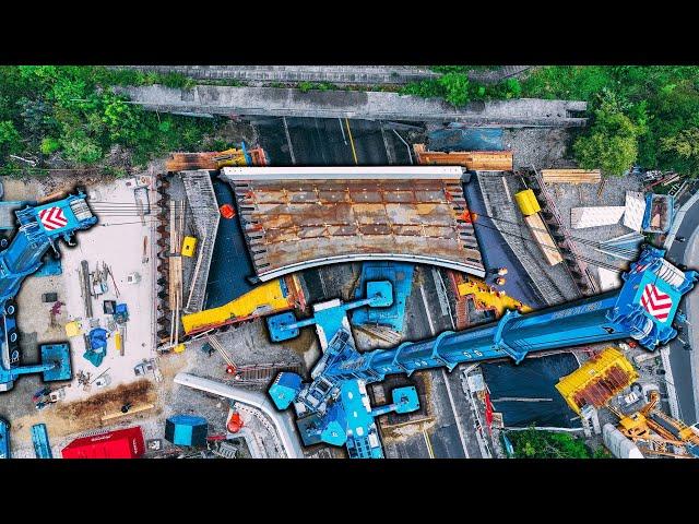 truck crane raises bridge | Munich, Germany