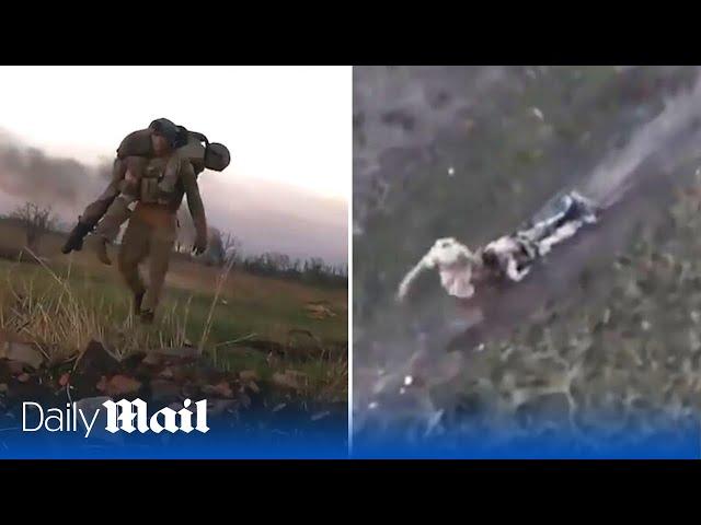 Two hero Ukraine soldiers save their wounded comrades by carrying them across Bakhmut battlefields