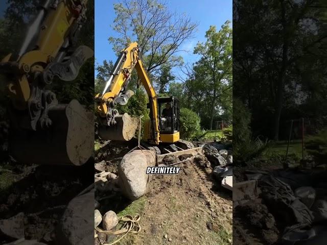 Setting a Giant Granite Boulder that was found in the forest on the edge of our customers property!!