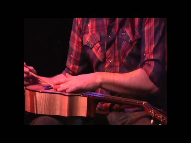 James Hill Playing The 'Ukulele With Chopsticks And A Comb