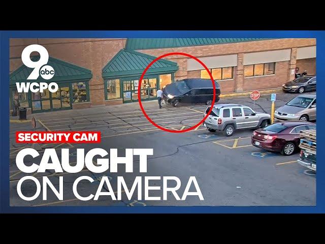 Surveillance cam catches moment woman crashes her vehicle into two men at Kroger