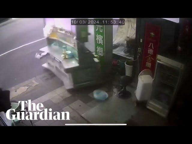 Typhoon Krathon blows away store equipment in Taiwan