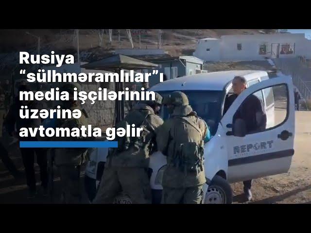 Separatçıya qayğı göstərən Rusiya “sülhməramlılar”ı media işçilərinin üzərinə avtomatla gəlir