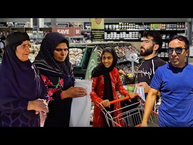 Shopping for the new house; Fariba and her daughter buy new goods