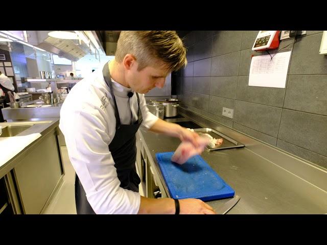 Chef Tim Boury prepares a seabass dish at 2 star (now 3*) restaurant Boury, Roeselare, Belgium