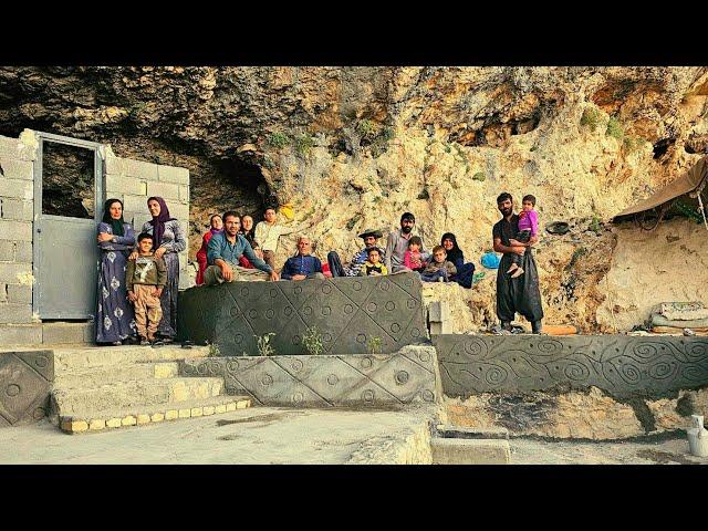 Transformation in the cave: Amir and her children decorate their cave house with cement