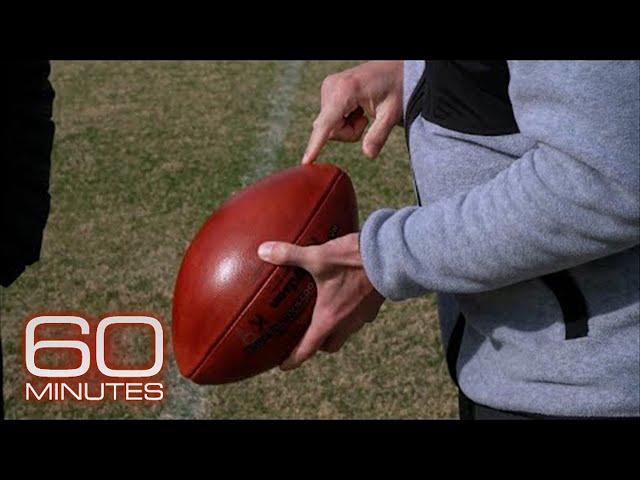 An NFL kicker's unique ball and shoes