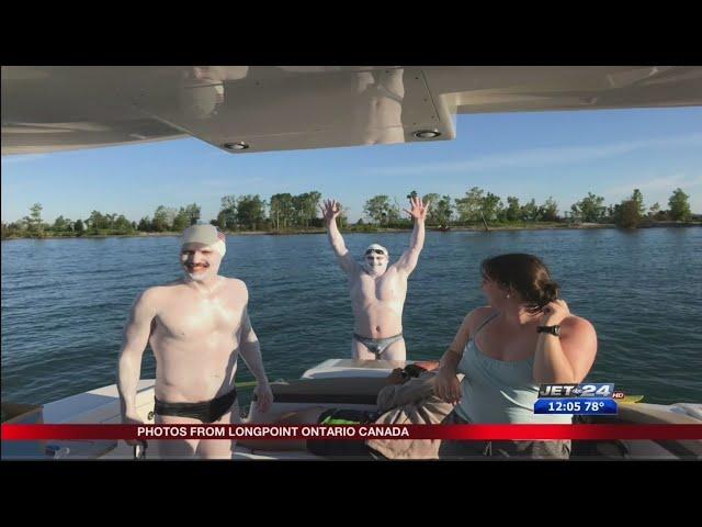 Tom and Greg Van Volkenburg swim 24 miles across Lake Erie