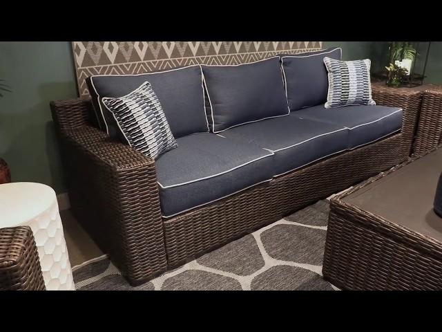 Grasson Lane Brown And Blue Outdoor Sofa With Cushion from Signature Design by Ashley