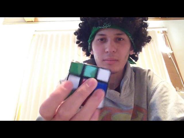 Kyle solves a Rubik's cube