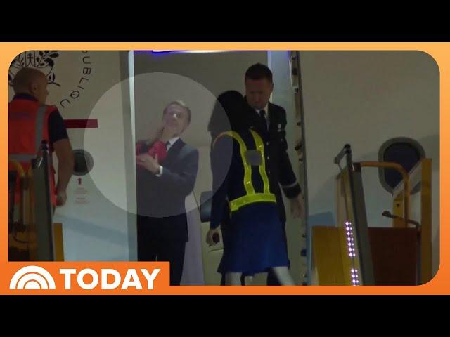Macron downplays video appearing to show his wife push his face
