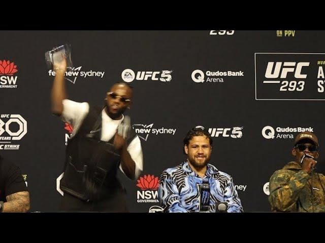 ABSOLUTE CHAOS AS MANEL KAPE THROWS DRINK BOTTLE AT KAI KARA-FRANCE DURING UFC 293 PRESS CONFERENCE