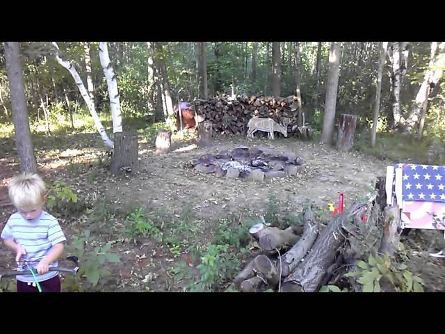 The boys target practicing with their bows