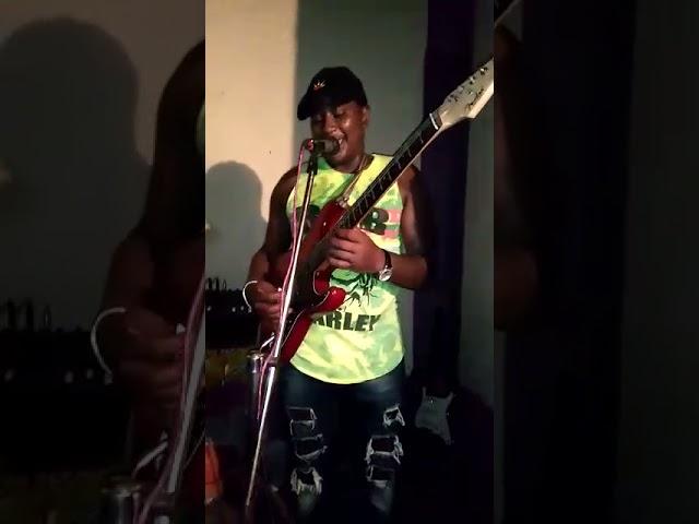Mayello singing with mukui WA miti Tala Boys Band