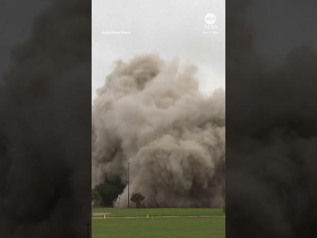 Hurricane-damaged skyscraper imploded