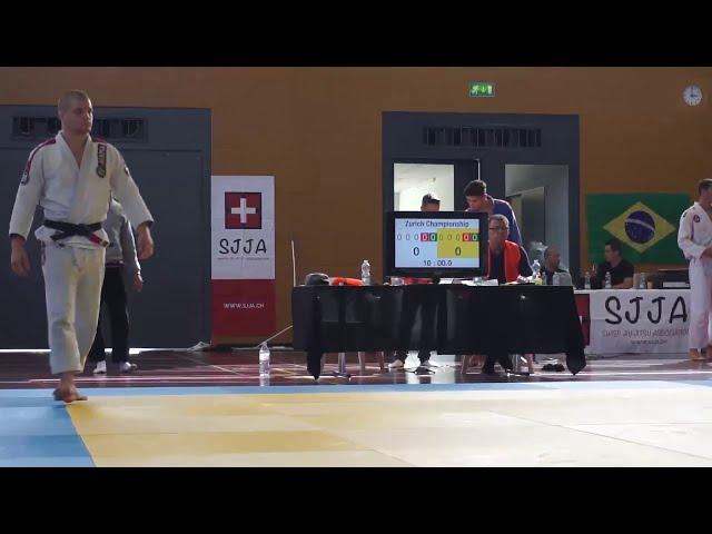 Swiss International Championship BlackBelt finals SJJA Peter Mettler - knee bar against De la Riva