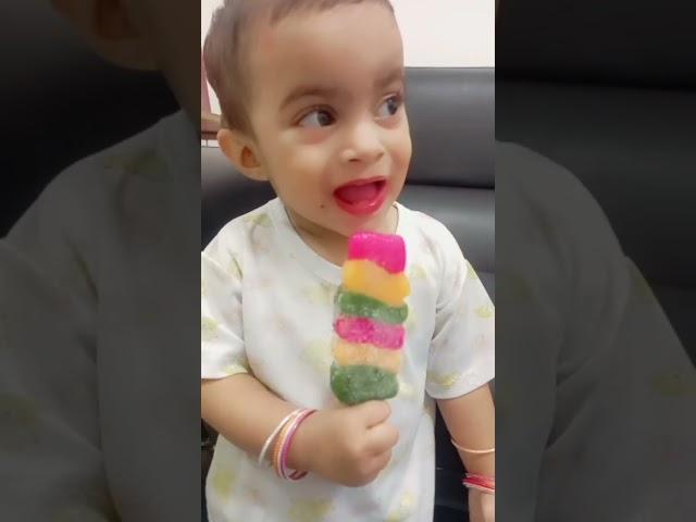 so cute baby hafsa  eating  ice cream so angry face   