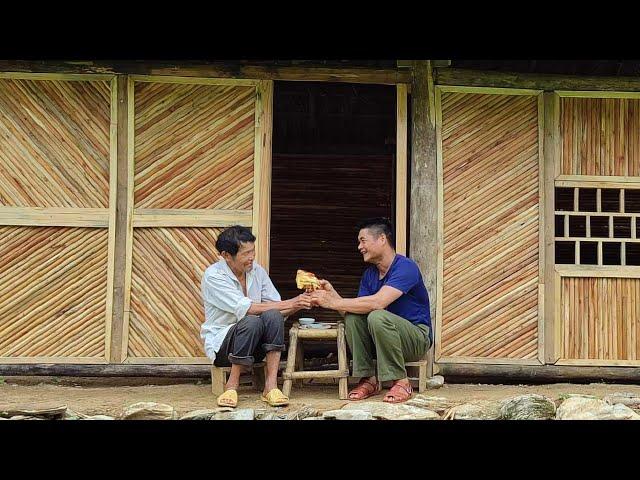 The old man and his son worked together to complete the walls for the new house. Enjoy the chicken