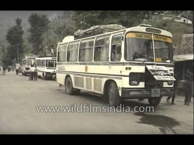 Old buses and Ambassador taxis from 1970's India