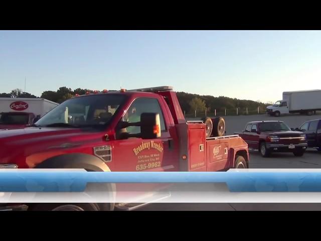 How A Tow Truck Driver Unlocks A Car