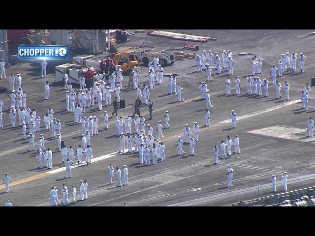 Chopper 10 flies over USS Dwight D. Eisenhower's homecoming