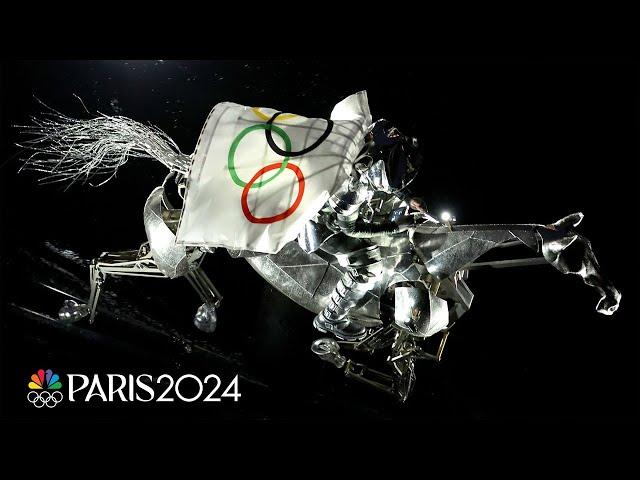 Metal horse gallops down Seine River to deliver Olympic flag | Paris Olympics | NBC Sports