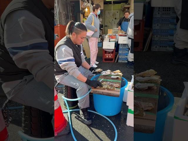 Tsukiji -a bustling fish market in Tokyo #japan #tokyo #fishmarket #tsukiji #travelvlog #streetfood