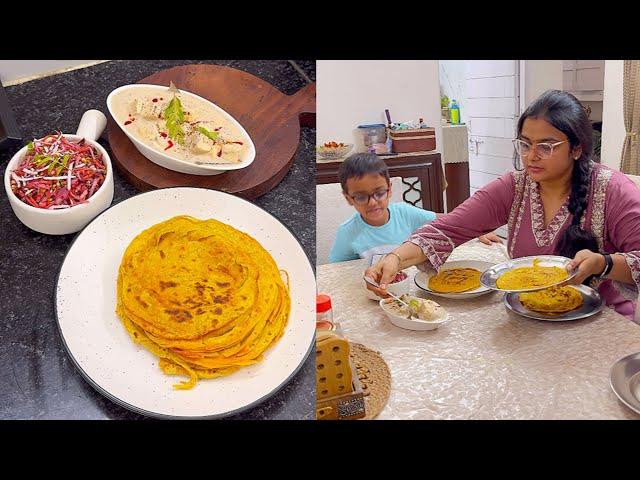 Aaj ki dawat me hai kuch khas, Malai paneer in white gravy, masala lacha paratha, colourful salad