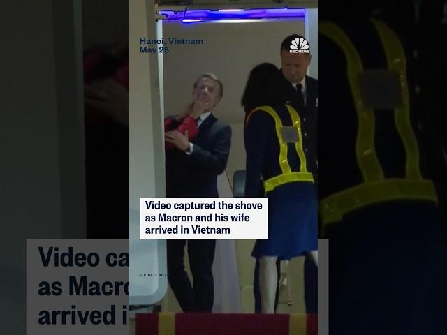 French President Emmanuel Macron's office is downplaying the moment his face was shoved