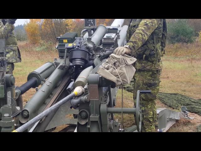 155 MM M777 Howitzer round can be seen flying