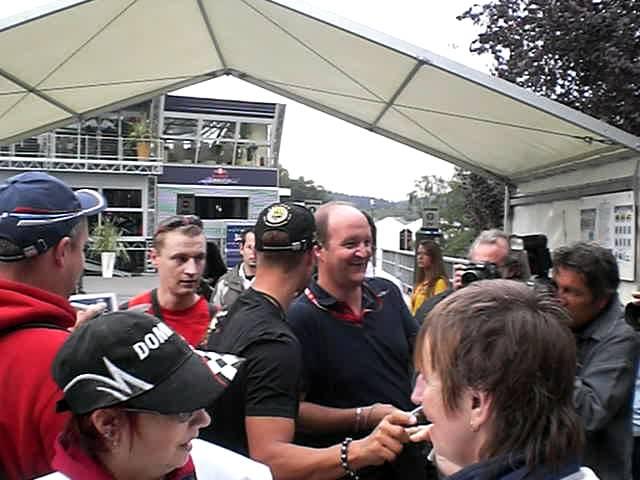 Michael Schumacher signing autographs at SPA 2011