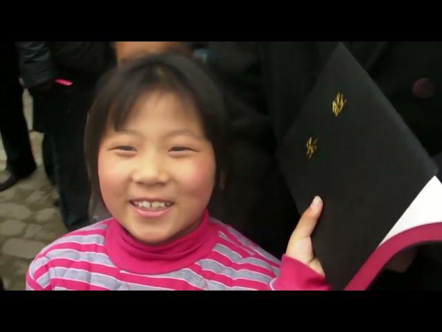 Footage: Chinese Christians Receiving Bibles For the First Time