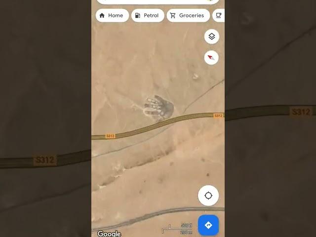 big hand on Earth