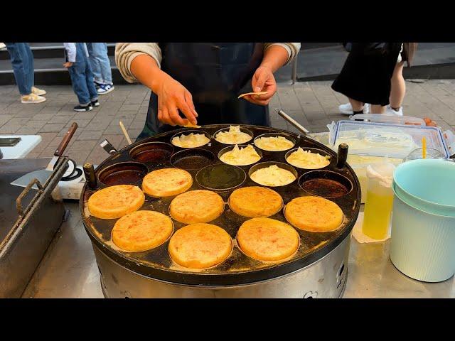 South Korea's BIGGEST Night Market! Food Walking Tour of Myeongdong Night Market