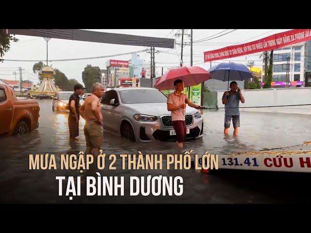 Bình Dương: Mưa ngập ở 2 thành phố, giao thông tắc nghẽn