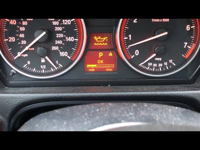 How to check engine oil level on 2009 BMW 328i