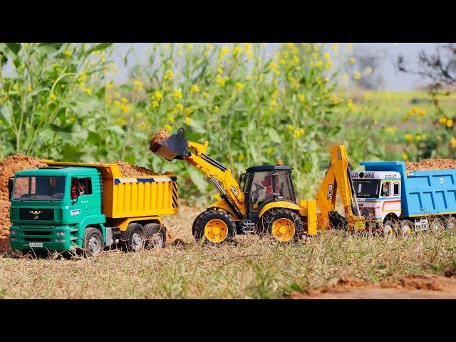 Jcb 5cx backhoe loading mud in Tata truck 2518 and Tata Tipper Truck | jcb video|@MDCCreator