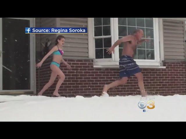 11-Year-Old Girl, Dad Enjoy Snow Day In Bathing Suits
