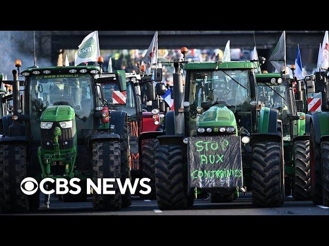 Farmers protest in France, blocking roads to Paris with manure and farm equipment