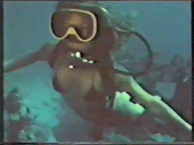 Vintage Scuba Diving Woman Dives and Snorkels 1970s