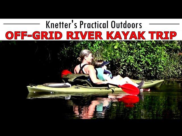 OFF-GRID FUN IN KAYAKS GOING DOWN THE RIVER