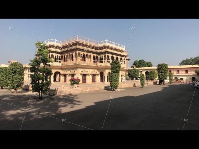 Jaipur, India - November 04, 2019: City Palace and tourists walk past the central building