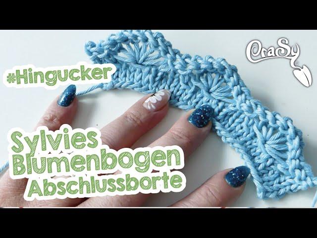 Die Bogen-Blumen-Borte als Abschluss stricken