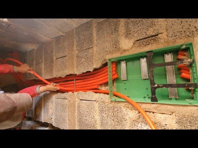 Installing the electricity distribution panel and installing the electrical pipes inside it