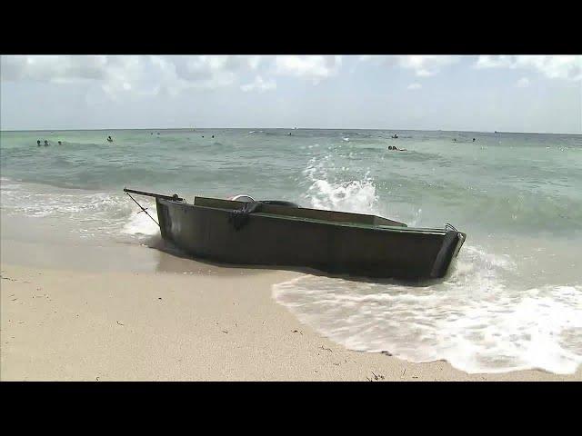 Cuban migrants ask beachgoers if they’ve made it to Miami